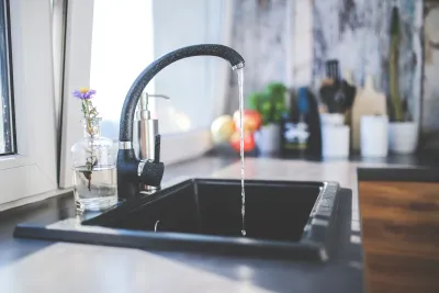 Anoka plumber performing plumbing inspection and repair